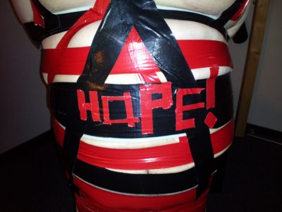 Detail on Hope's adding her name in duct tape