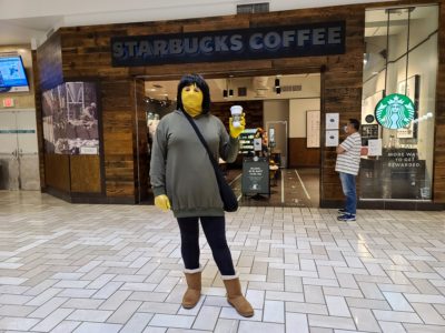 Standing in front of Starbucks at Tysons Corner Mall, holding up a cup of coffee.  My girlfriend described this photo as my having achieved "basic bitch" status.