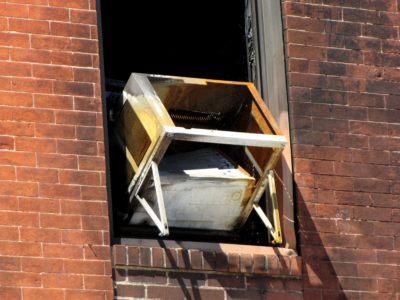 An air conditioning unit on the east facade appeared gutted, and leaned back into the building.  Of all of the things on the building, this made me the most nervous, as this seemed like it presented an imminent danger of falling onto those on the street below.