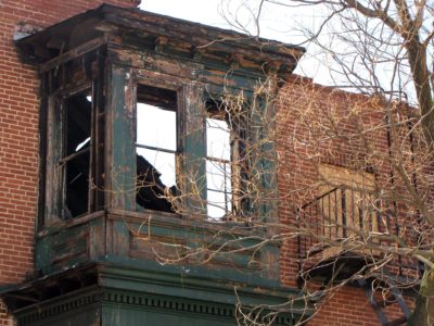 Bay window as viewed from across Read Street, showing the collapsed roof.  From what I could tell, lacking access to view the structure from above, the roof collapsed over the west (back) part of the higher portion of the third floor, starting at the bay window.