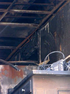 From my visit to the Play House, I recall that this was a small kitchenette in what was otherwise a social room right off of the parking garage.  It was still recognizable as such, though badly burned.