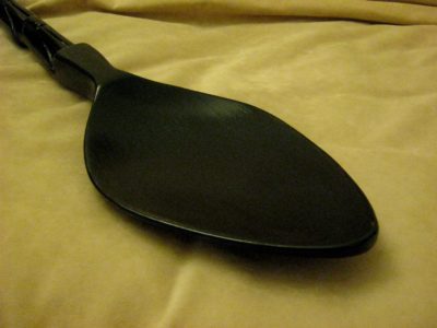 The concave side of the spoon