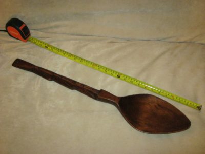 Large wooden spoon, shown here with tape measure to demonstrate size
